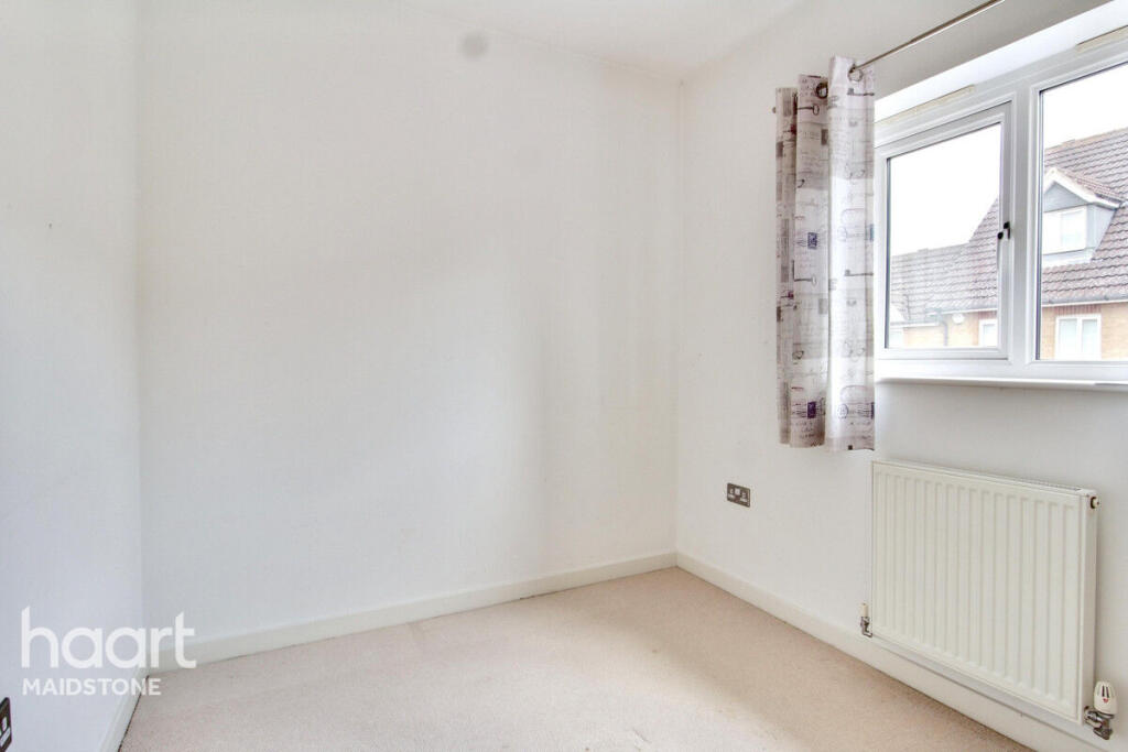 Before: brokerage listing photo staged as an office